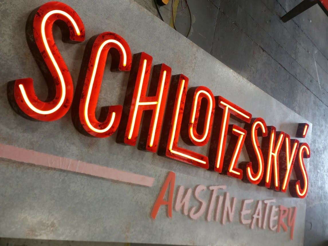 Neon signage for Schlotzsky’s Austin Eatery