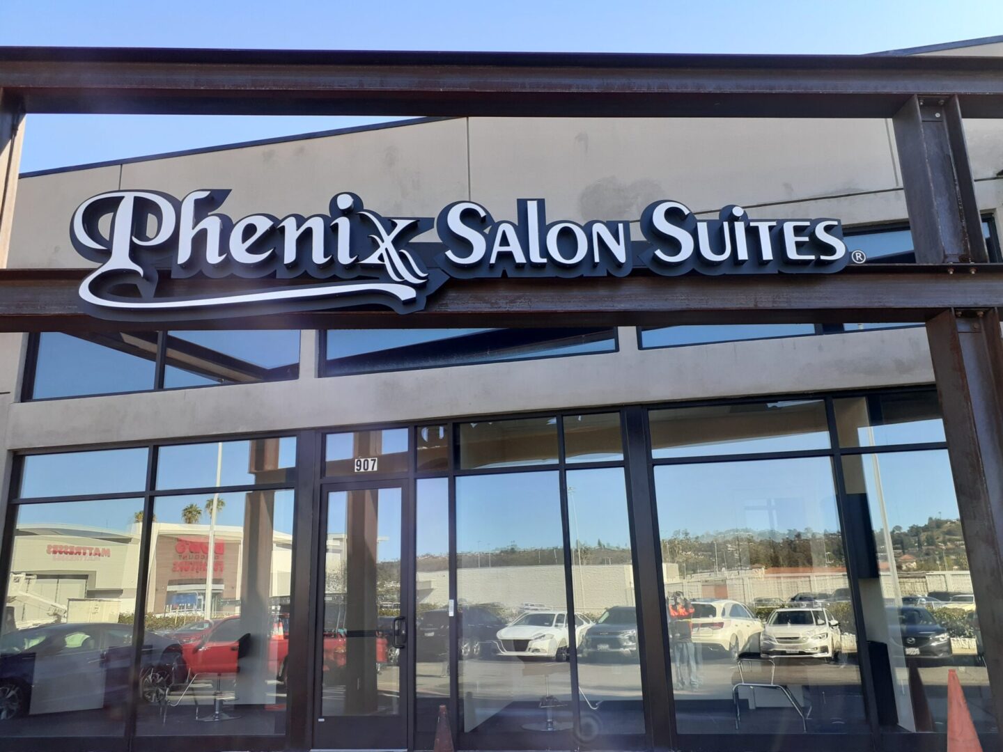 Stylized signage of Phenix Salon Suites